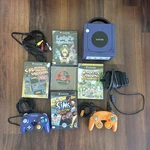 Cube, 2 Controllers, Power Cables Av 5 Games Super Smash Bros.. Fixed Price $200.00.