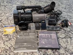 Panasonic DVX100 3CCD +wide Angle Lens, Batteries, Charger, Book - Only 306 Hrs. Fixed Price $550.00.