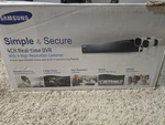 Samsung 4CH Real-time Dvr W/ Hi-res Cameras 1TB Hdd #SDE-3003 New Open Box. Fixed Price $200.00.